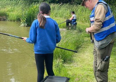 Angling coach and student